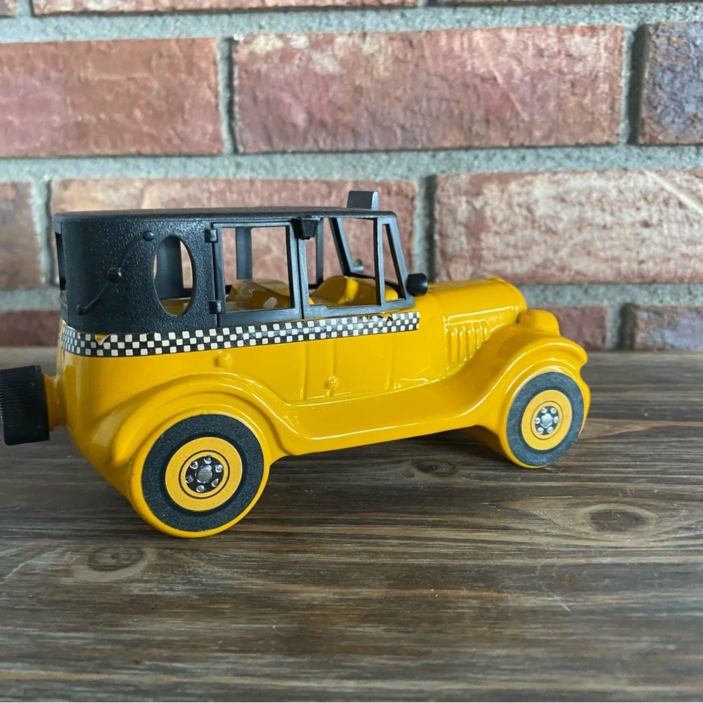 Vintage 1926 checker cab Avon Everest after shave